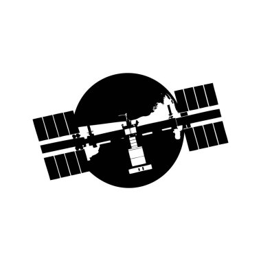 Dış uzay görüntülerinde Dünya 'nın yörüngesindeki Uluslararası Uzay İstasyonunun Silueti
