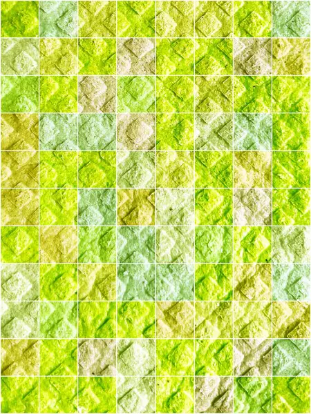 Pastel yeşil tonlarda dokulu yüzeyi olan soyut mozaik arkaplan.