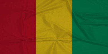 Açık Mavi Gökyüzüne Karşı Rüzgarda Dalgalanan Gine Bayrağı