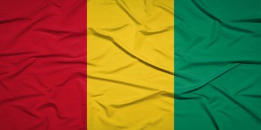 Açık Mavi Gökyüzüne Karşı Rüzgarda Dalgalanan Gine Bayrağı