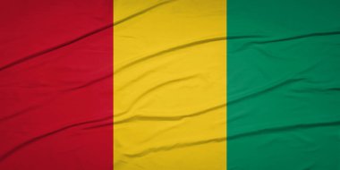 Açık Mavi Gökyüzüne Karşı Rüzgarda Dalgalanan Gine Bayrağı