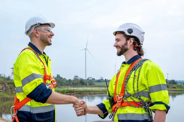 Engineers Handshake Inspection Work Wind Turbine Power Generator Station — Stock Photo, Image