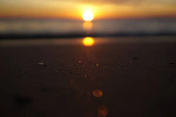 Güneş ve bulutlarla gün batımı