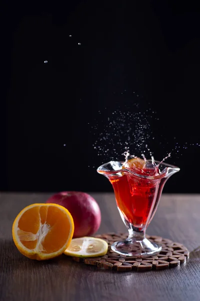 Sangria Glass Table Splashes Falling Ice Nearby Lie Tangerine Lemon — Stock Photo, Image