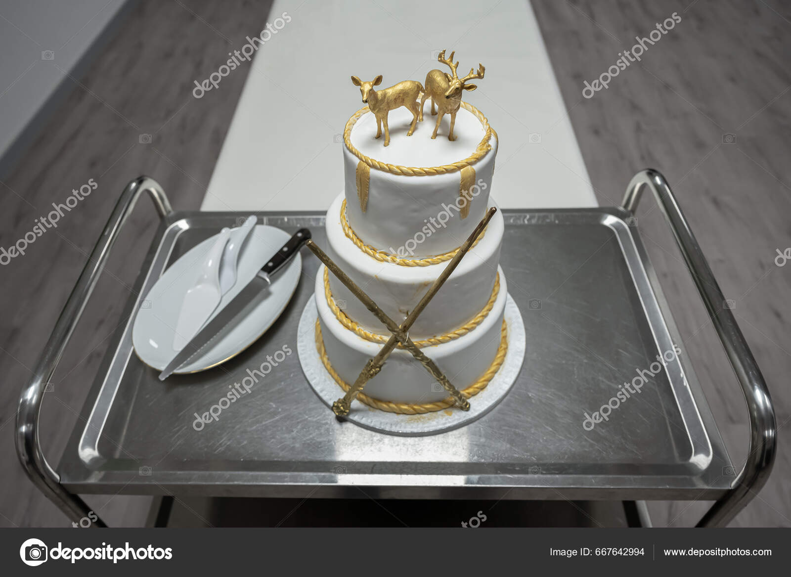 Two Rendeer Wedding Cake Toppers Magig Sticks Gold Elements Harry Stock  Photo by ©donogl 671785008