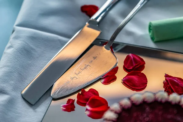 Wedding cake knife tool with text And they Lived Happily Ever After.