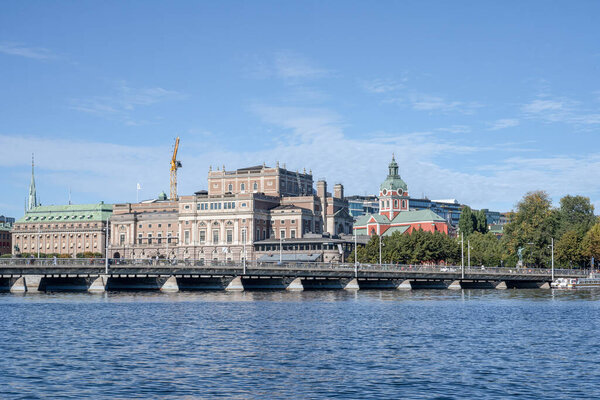 Scenic summer panorama of the Old Town Gamla Stan pier architecture in Stockholm, Sweden.
