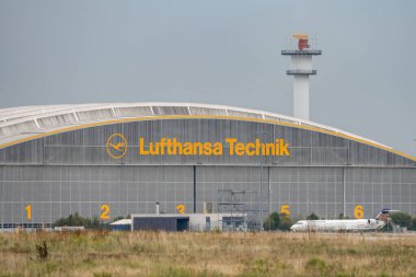 Frankfurt Germany 11.08.19 Lufthansa Technik tec repair hangar. Fraport main hub City Line and Lufthansa Cargo. clipart