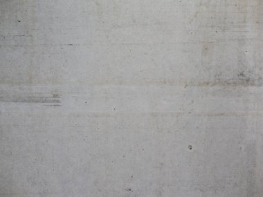 Somut doku arka planı. İç duvarda güzel bir malzeme yapısı var. Bina yüzeyindeki boş arkaplanı özetle.