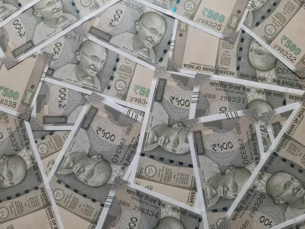 Hindistan 'ın 500 rupilik banknotlarına yakından bak. Hint parası. Renkli para arkaplanı