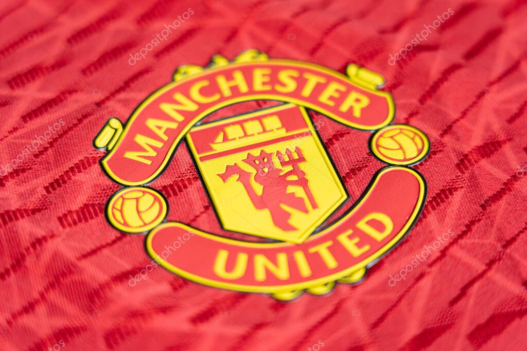 CHIANG MAI ,THAILAND - June 30, 2023 : New home Shirt English football club Manchester United emblem on jersey.