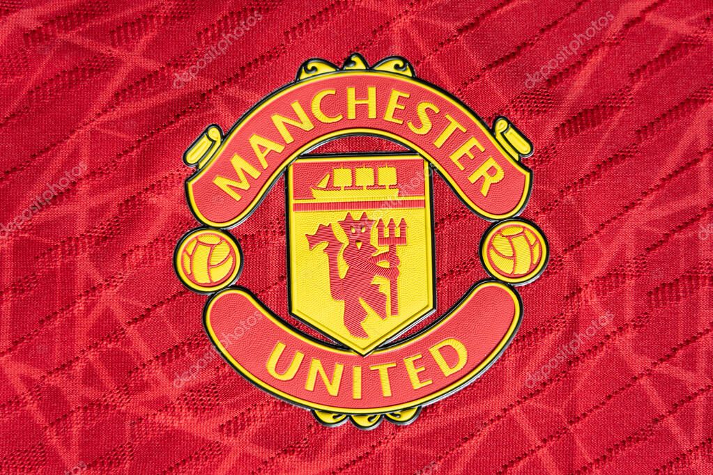 CHIANG MAI ,THAILAND - June 30, 2023 : New home Shirt English football club Manchester United emblem on jersey.