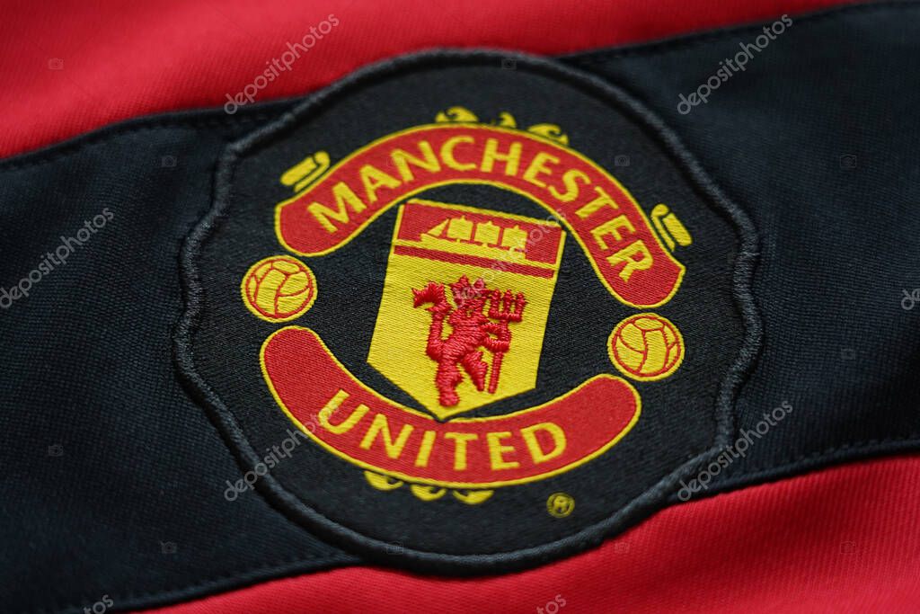 CHIANG MAI ,THAILAND - September 26, 2024 :Home Shirt English football club Manchester United emblem on jersey.