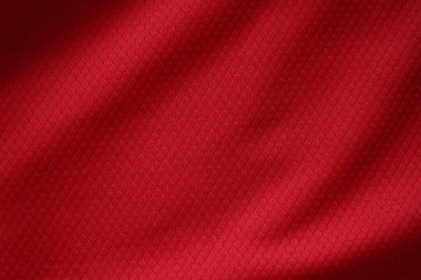 Kırmızı futbol forması, spor kıyafetleri kumaş dokusunu kapatın..