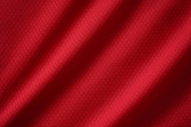 Kırmızı futbol forması, spor kıyafetleri kumaş dokusunu kapatın..