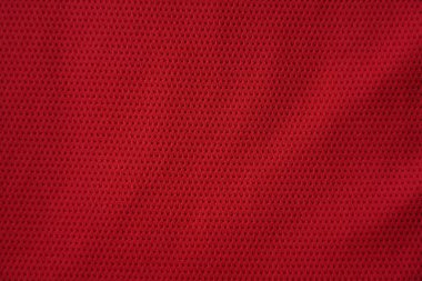 Kırmızı futbol forması, spor kıyafetleri kumaş dokusunu kapatın..