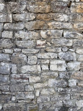 Kaba taş duvarın detaylı dokusu. Arkaplan, tasarım ve 3 boyutlu modeller için ideal.