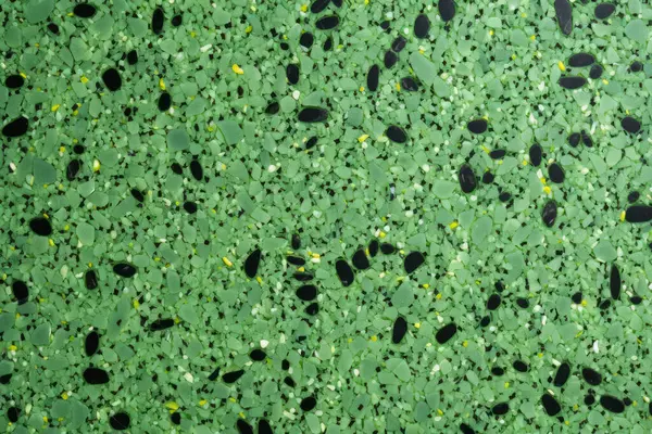 Yeşil terrazzo yüzey dokusunun işlenmiş kolajı. Pankart, arkaplan veya 3B haritalama için doku