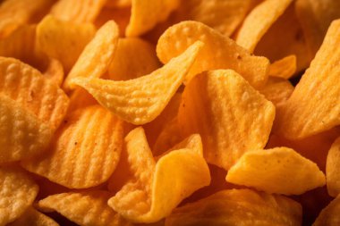 İşlenmiş portakal cipsi makro fotoğraf kolajı. Pankart, arkaplan veya 3B haritalama için doku