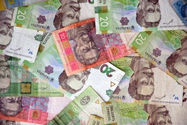 Ukrayna 'nın işlenmiş Hryvnia UAH kolajı banknotların dokusunu destekler. Pankart, arkaplan veya 3B haritalama için doku