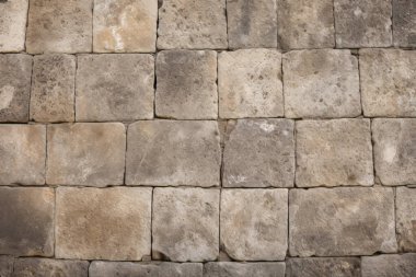 Antik sarı blok duvar dokusunun işlenmiş kolajı. Pankart, arkaplan veya 3B haritalama için doku