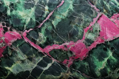 Zoisite tanzanit taşından işlenmiş kolaj mor ve yeşil doku. Pankart, arkaplan veya 3B haritalama için doku