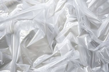 Buruşmuş politen plastik ambalaj kağıdının fotoğrafı. Arkaplan veya haritalama için arkaplan dokusu