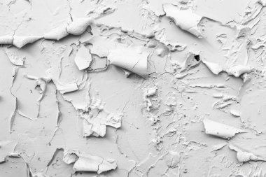 Kabuğu soyulmuş beyaz alçı duvarın fotoğrafı. Arkaplan veya haritalama için arkaplan dokusu