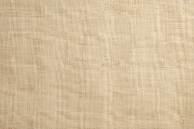 Eski sarı tuval kumaş dokusunun işlenmiş kolajı. Pankart, arkaplan veya 3B haritalama için doku