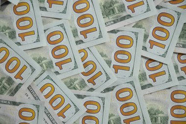 Birçok yüz dolarlık banknot dokusunun işlenmiş kolajı. Pankart, arkaplan veya 3B haritalama için doku