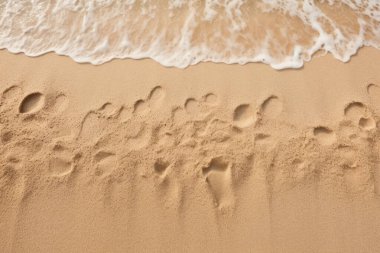 Deniz kıyısı kumlarının işlenmiş kolajı yüzey dokusu. Pankart, arkaplan veya 3B haritalama için doku