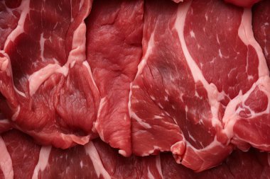 İşlenmiş taze çiğ et yüzey dokusu kolajı. Pankart, arkaplan veya 3B haritalama için doku
