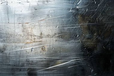 Silver 'ın fotoğrafı eski metal levhayı tırmalamış. Arkaplan veya haritalama için arkaplan dokusu