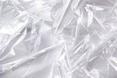 Buruşmuş politen plastik ambalaj kağıdının fotoğrafı. Arkaplan veya haritalama için arkaplan dokusu