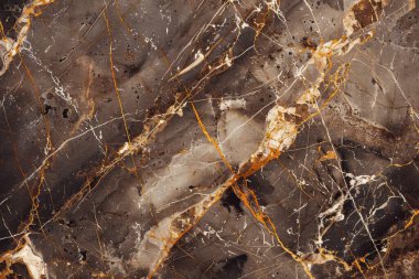 Beyaz damarlı sıcak kahverengi mermer desenli fotoğraf. Arkaplan veya haritalama için arkaplan dokusu