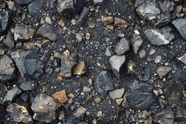 Gri asfalt kaya döküntülerinin fotoğrafı. Arkaplan veya haritalama için arkaplan dokusu