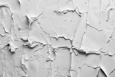 Kabuğu soyulmuş beyaz alçı duvarın fotoğrafı. Arkaplan veya haritalama için arkaplan dokusu