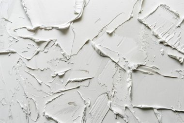 Düz yüzeydeki birçok akrilik yağlı boya lekelerinin fotoğrafı. Arkaplan veya haritalama için arkaplan dokusu