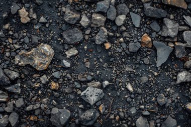 Gri asfalt kaya döküntülerinin fotoğrafı. Arkaplan veya haritalama için arkaplan dokusu