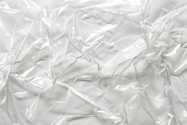 Buruşmuş politen plastik ambalaj kağıdının fotoğrafı. Arkaplan veya haritalama için arkaplan dokusu