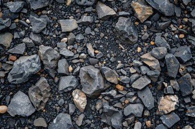 Gri asfalt kaya döküntülerinin fotoğrafı. Arkaplan veya haritalama için arkaplan dokusu