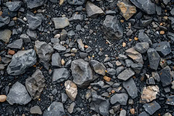 Gri asfalt kaya döküntülerinin fotoğrafı. Arkaplan veya haritalama için arkaplan dokusu