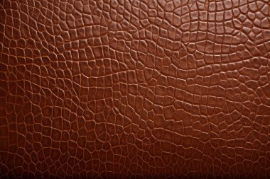 Kahverengi deri yüzey dokusundan işlenmiş kolaj. Pankart, arkaplan veya 3B haritalama için doku