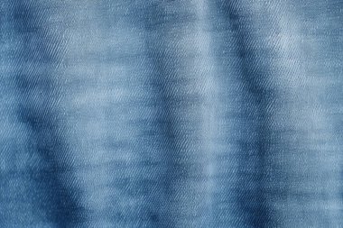 Katlanmış kolajın işlenmiş kolajı kot mavi kumaş dokusunu denetler. Pankart, arkaplan veya 3B haritalama için doku