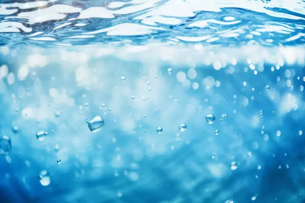 Güneş ışığında işlenmiş mavi su materyali dokusu kolajı. Pankart, arkaplan veya 3B haritalama için doku