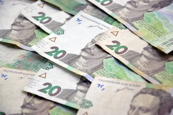 Ukrayna 'nın işlenmiş Hryvnia UAH kolajı banknotların dokusunu destekler. Pankart, arkaplan veya 3B haritalama için doku