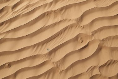 Çöl kumlarının işlenmiş kolajı yüzey dokusu. Pankart, arkaplan veya 3B haritalama için doku