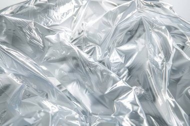 Buruşmuş politen plastik ambalaj kağıdının fotoğrafı. Arkaplan veya haritalama için arkaplan dokusu