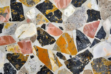 Zemin yüzeyindeki gri terrazzo parçacıklarının fotoğrafı. Arkaplan veya haritalama için arkaplan dokusu