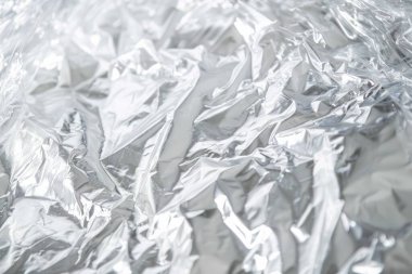 Buruşmuş politen plastik ambalaj kağıdının fotoğrafı. Arkaplan veya haritalama için arkaplan dokusu